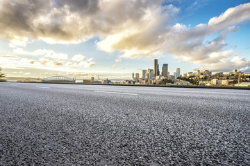 cityscape of modern city from empty asphalt road