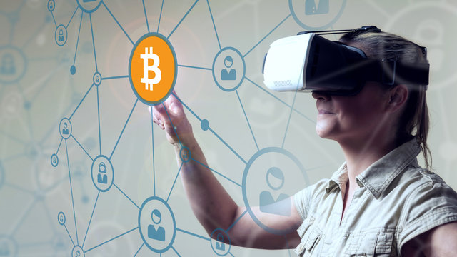 Young Woman looking through VR (Virtual Reality) glasses - Pointing Finger on screen Bitcoin Icon