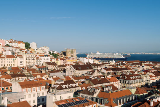 Elevated view of Lisbon skyline with a cruise ship