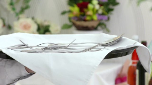 Waiter setting the table Cutlery. Restaurant service the elite of the party. 