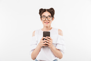 Fototapeta premium Portrait of a smiling young girl in sunglasses