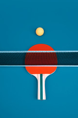Table tennis or ping pong rackets and ballse.