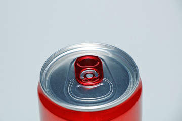 Metal cans with cooling drinks on a white background