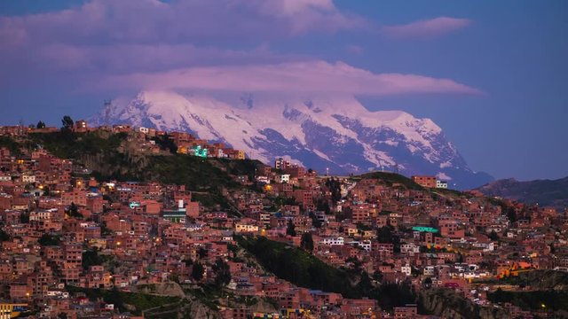 Timelapse of the mountain of Illimani and the city of La Paz during sunset, Bolivia