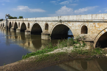 Fototapeta na wymiar Bridge from period of Ottoman Empire over Meric River in city of Edirne, East Thrace, Turkey