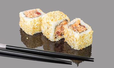 Japanese food, roll with salmon and sticks