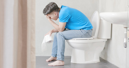 man feel pain with constipation - obrazy, fototapety, plakaty