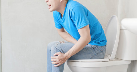 man feel pain with constipation