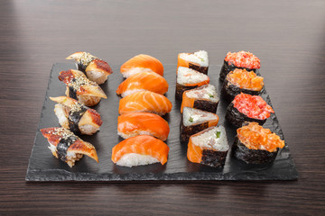 japanese cuisine, sushi set on a board