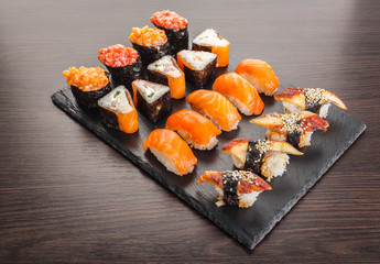 japanese cuisine, sushi set on a board