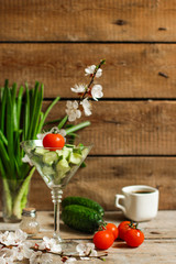 salad cucumbers and tomatoes (ovoshchno salad) - cuisine.  Food background