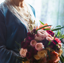 Stunning bridal bouquet. Wedding ceremony. Mix of peony, succulents, orchids and roses. Modern bridal accessories. Wedding flowers