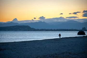 Walk on the beach at sunset