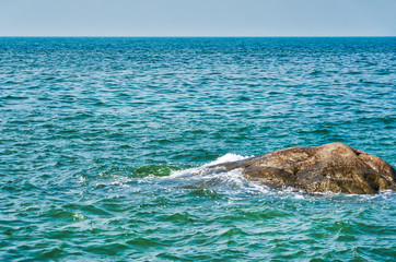 Scenic View of Seascape with Rock and Horizon