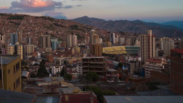 Zoom out timelapse of the city of La Paz during sunset, Bolivia.