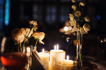 Wedding tables set for banquet or wedding event catering. Party celebration wedding concept. Flowers wedding decoration of tables for guests of bride and groom. Table appointment event