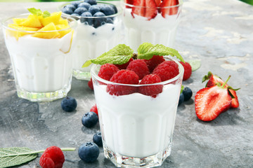 Yogurt and berry. Fresh fruit yogurt with fresh berries and peaches