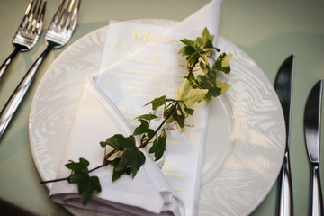 Wedding tables set for banquet or wedding event catering. Party celebration wedding concept. Flowers wedding decoration of tables for guests of bride and groom. Table appointment event