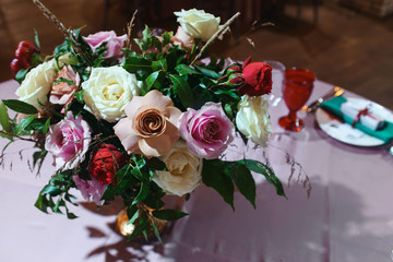 Wedding tables set for banquet or wedding event catering. Party celebration wedding concept. Flowers wedding decoration of tables for guests of bride and groom. Table appointment event