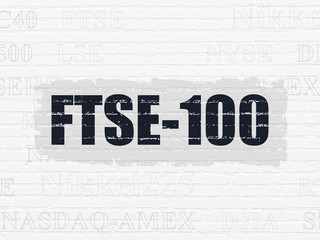 Stock market indexes concept: Painted black text FTSE-100 on White Brick wall background with  Tag Cloud