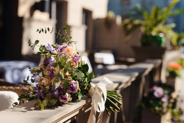 Beautiful close-up of a flower arrangement or bouquet with colorful flowers. Decoration of wedding reception or bridal bouquet. Macro shot flowers with selective focus