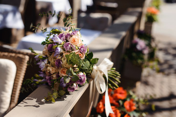 Beautiful close-up of a flower arrangement or bouquet with colorful flowers. Decoration of wedding reception or bridal bouquet. Macro shot flowers with selective focus