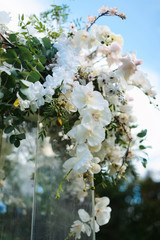 Beautiful close-up of a flower arrangement or bouquet with colorful flowers. Decoration of wedding reception or bridal bouquet. Macro shot flowers with selective focus