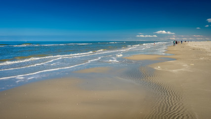The sun is shining on a September afternoon when walking along the Wadden Sea and the gorgeous coastline of the Dutch Wadden Isle of Schiermonnikoog.