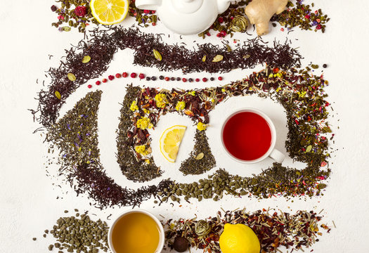 Fototapeta The word tea made from different variety of tea. Tea concept