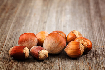 Hazelnut on a wooden background. Healthy food