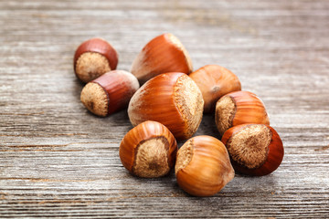 Hazelnut on a wooden background. Healthy food