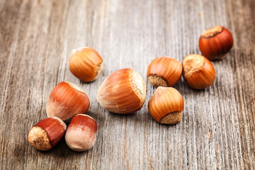 Hazelnut on a wooden background. Healthy food