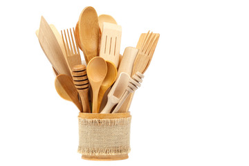Wooden kitchen utensils isolated on white background