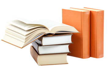 Books in a stack on white background.