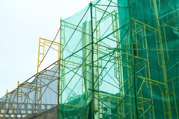 Mesh filter protection texture background, mesh filter in construction area with blue sky background