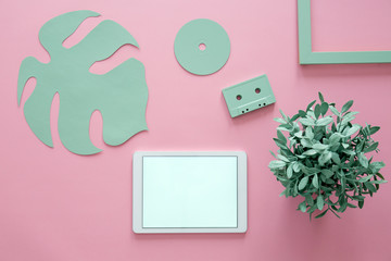 Tablet against pink background