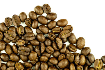 close up of medium or dark roasted coffee beans isolated on white background, can be used as a background or graphic object in your ads.