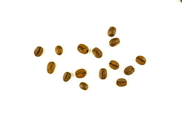 close up of medium or dark roasted coffee beans isolated on white background, can be used as a background or graphic object in your ads.