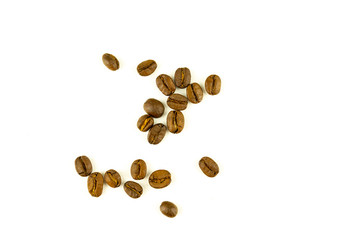 close up of medium or dark roasted coffee beans isolated on white background, can be used as a background or graphic object in your ads.