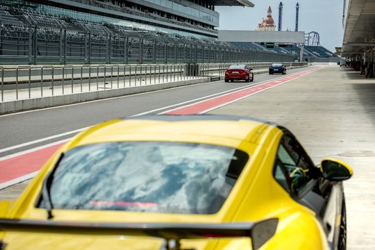 Fototapeta sports racing cars on the track