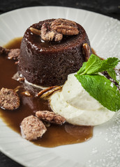 molten lava cake with candied walnuts and whipped cream with mint
