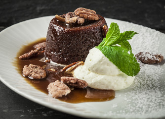 molten lava cake with candied walnuts and whipped cream with mint