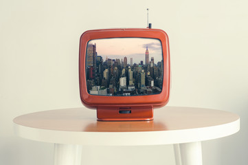 view of modern Manhattan in New York in an old retro TV screen. Creative concept