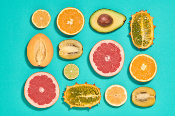Vegan Layout. Tropical Fruits. Orange Lemon Citrus Avocado Grapefruit. Fresh Organic Food Concept. Flat lay. Creative Trendy fashion Style. Design Art. Summer Set.