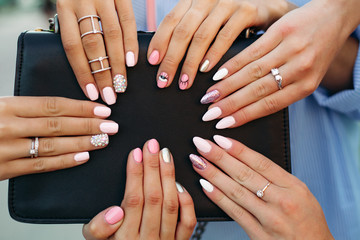 Different fashionable and trendy manicure with design on girl s hands. - obrazy, fototapety, plakaty