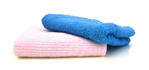 colorful stacked bathroom towels on a white background