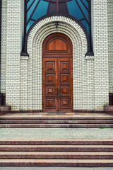 Old wooden door to church