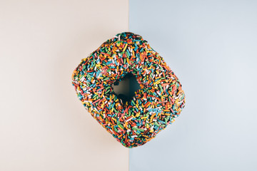 Square donut with colorful sprinkle. sweet food and dessert concept