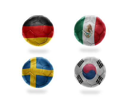 group F. football balls with national flags of germany, mexico, sweden, south korea. soccer teams