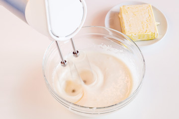 mixer for the dough on white table